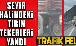 SEYİR HALİNDEKİ TIRIN TEKERLEKLERİ YANDI