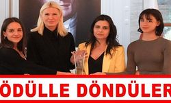 ÖDÜLLE DÖNDÜLER