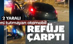 FRENİ TUTMAYAN OTOMOBİL REFÜJE ÇARPTI