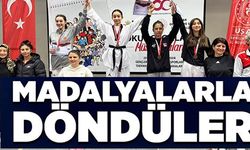 MADALYALARLA DÖNDÜLER