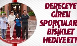 DERECEYE GİREN SPORCULARA BİSİKLET HEDİYE ETTİ