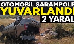 OTOMOBİL ŞARAMPOLE YUVARLANDI: 2 YARALI