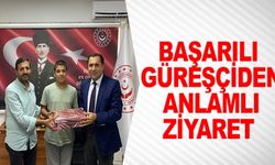 BAŞARILI GÜREŞÇİDEN ANLAMLI ZİYARET