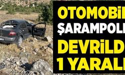 OTOMOBİL ŞARAMPOLE DEVRİLDİ