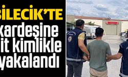 KARDEŞİNE AİT KİMLİKLE YAKALANDI