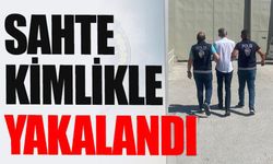 SAHTE KİMLİKLE YAKALANDI