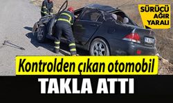 EHLİYETSİZ SÜRÜCÜ TAKLA ATAN OTOMOBİLDE YARALANDI