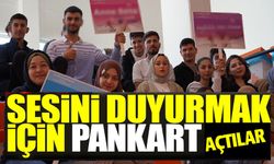 SESİNİ DUYURMAK İÇİN PANKART AÇTILAR!