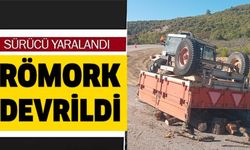 TRAKTÖR RÖMORKU DEVRİLDİ, SÜRÜCÜSÜ YARALANDI