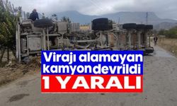 VİRAJI ALAMAYAN KAMYON DEVRİLDİ!