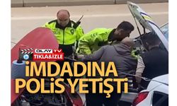 YOLDA KALAN OTOMOBİLİN İMDADINA TRAFİK POLİSLERİ YETİŞTİ