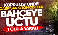 KÖPRÜ ÜSTÜNDE ÇARPIŞAN OTOMOBİLLER BAHÇEYE UÇTU: 1 ÖLÜ, 4 YARALI