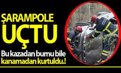 UÇURUMDAN YUVARLANAN ARAÇTAN BURNU BİLE KANAMADAN ÇIKTI