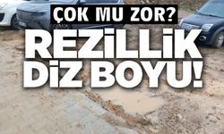 HASTANE OTOPARKI YETERSİZ KALINCA, SÜRÜCÜLER ARAÇLARINI ÇAMUR İÇİNDEKİ ALANA PARK EDİYORLAR