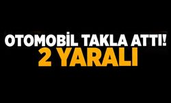 YAĞMUR KANALINA GİREN OTOMOBİL TAKLA ATTI: 2 YARALI