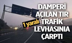 DAMPERİ AÇILAN TIR TRAFİK LEVHASINA ÇARPTI: 1 YARALI