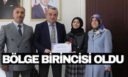 BÖLGE BİRİNCİSİ ÖĞRENCİYE KAYMAKAM ÖZTÜRK'TEN TEBRİK