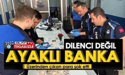 DİLENCİNİN ÜZERİNDEN ÇIKAN PARA ŞAŞIRTTI