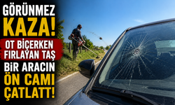 OT BİÇERKEN FIRLAYAN TAŞ BİR ARACIN ÖN CAMI ÇATLATTI