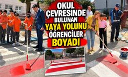 OKUL ÇEVRESİNDE BULUNAN YAYA YOLUNU ÇOCUKLAR BOYADI