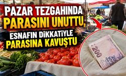PAZAR TEZGÂHINDA UNUTTUĞU PARAYA ESNAFIN DİKKATİ SAYESİNDE KAVUŞTU