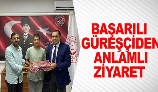 BAŞARILI GÜREŞÇİDEN ANLAMLI ZİYARET