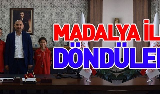 MADALYA İLE DÖNDÜLER