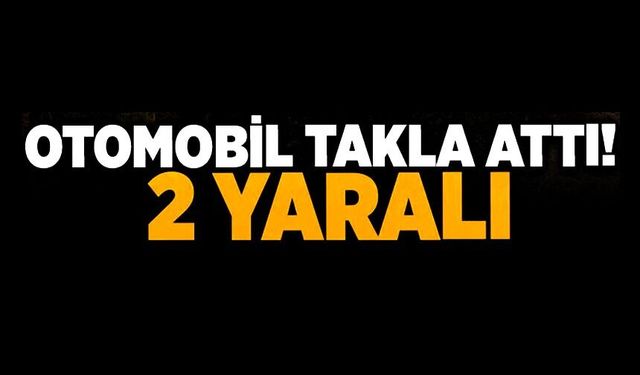 YAĞMUR KANALINA GİREN OTOMOBİL TAKLA ATTI: 2 YARALI
