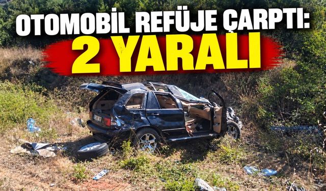 OTOMOBİL REFÜJE ÇARPTI: 2 YARALI
