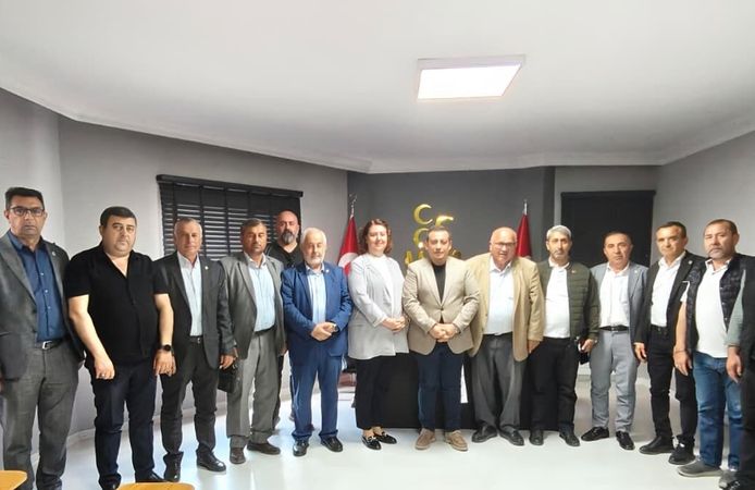 MHP İL BAŞKANI ÖZKAN MUHTARLARLA BİR ARAYA GELDİ