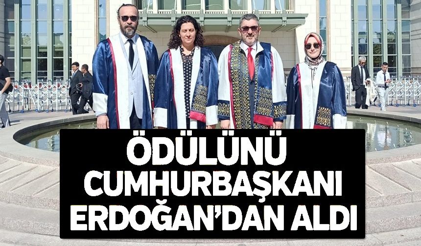 ÖDÜLÜNÜ CUMHURBAŞKANI ERDOĞAN'DAN ALDI