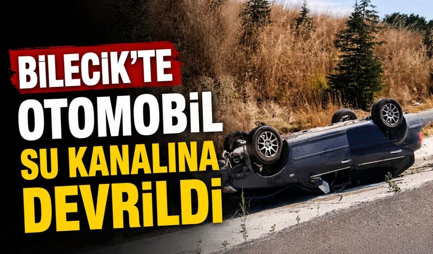 OTOMOBİL SU KANALINA DEVRİLDİ