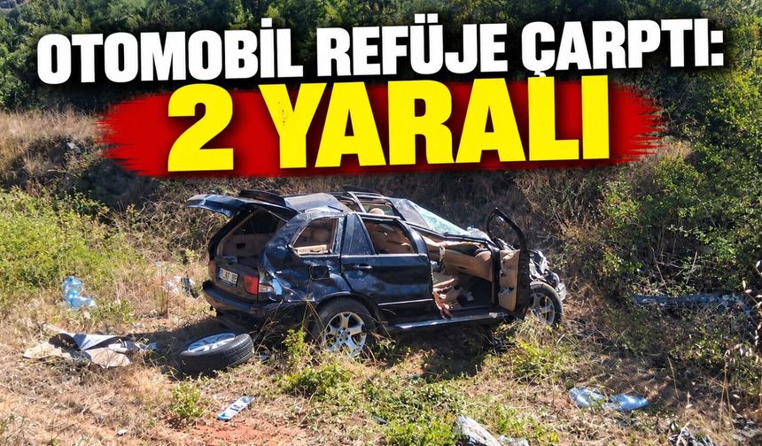 OTOMOBİL REFÜJE ÇARPTI: 2 YARALI