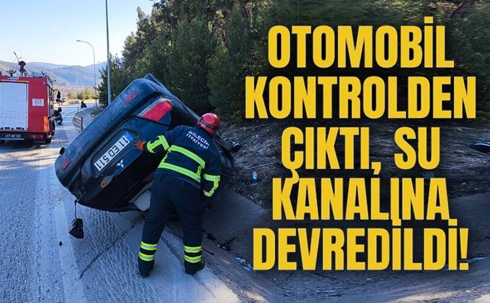 KONTROLDEN ÇIKAN OTOMOBİL SU KANALINA DEVRİLDİ
