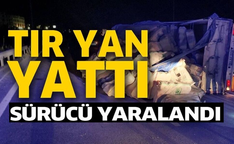 KONTROLDEN ÇIKAN TIR REFÜJE ÇARPIP YAN YATTI: 1 YARALI