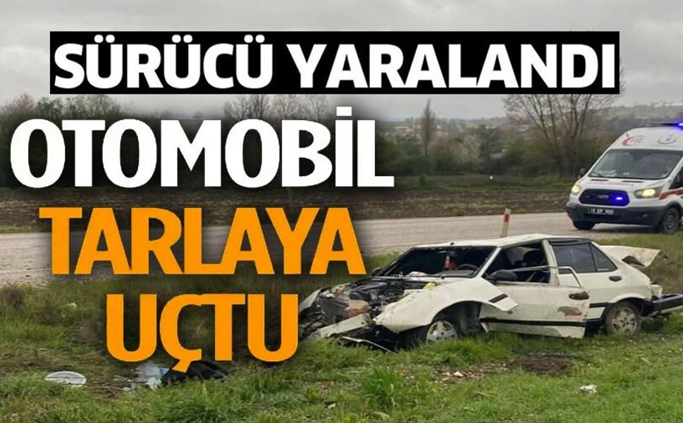 OTOMOBİL TARLAYA UÇTU, SÜRÜCÜSÜ YARALANDI